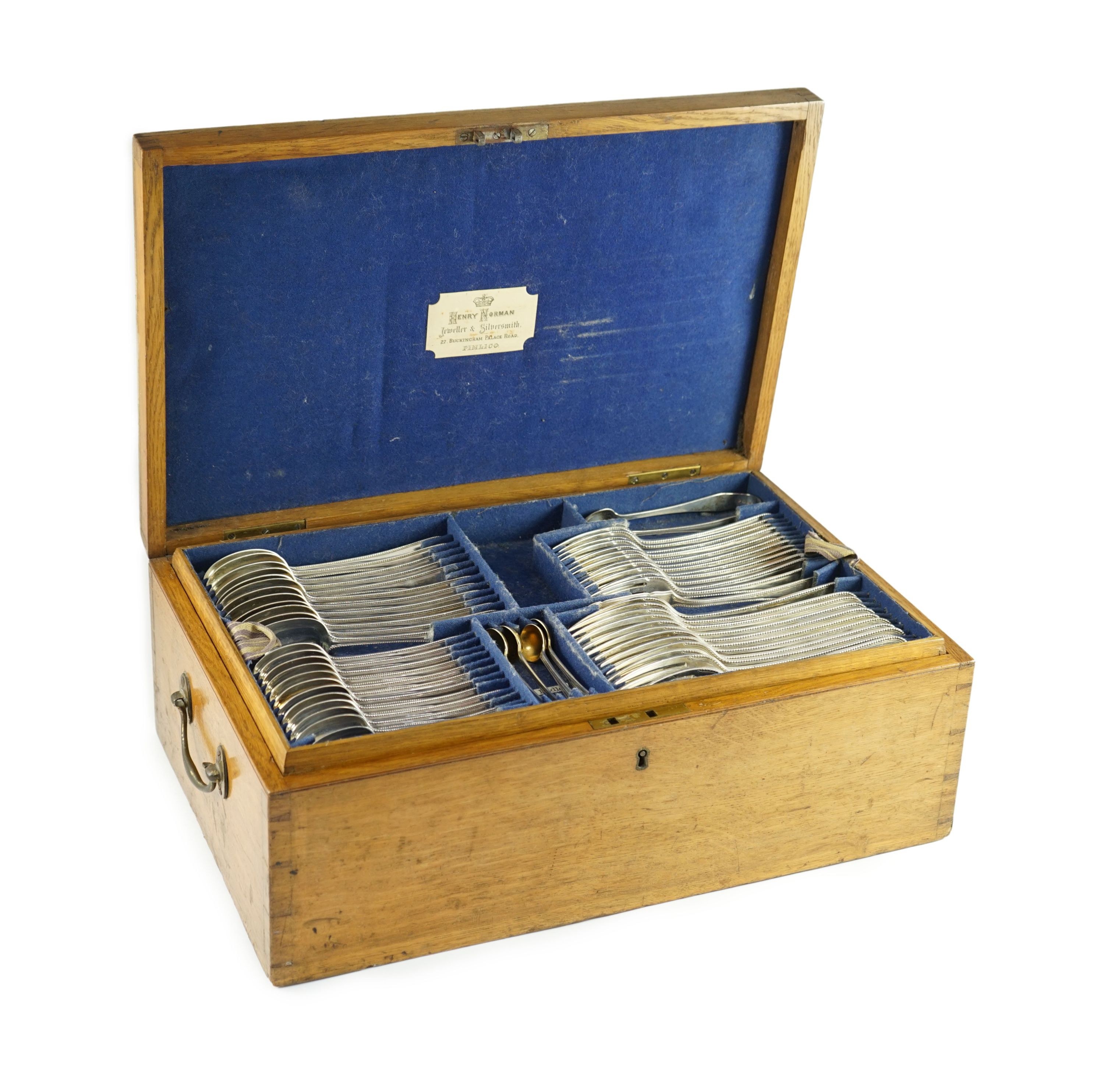 A Victorian part canteen of silver double struck Old English beaded pattern cutlery by George Adams